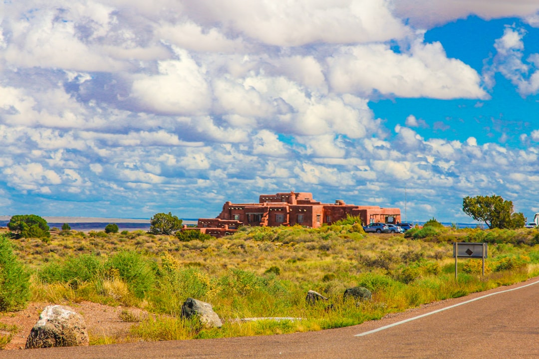a large building sitting on the side of a road
